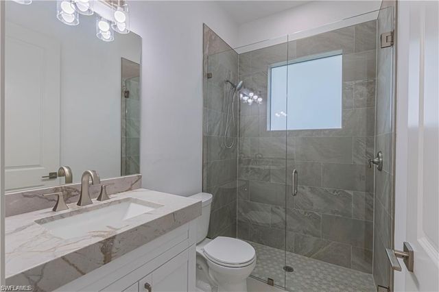 3098 Pine Tree DR, Naples, FL 34112