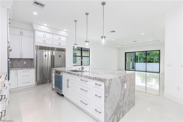 3098 Pine Tree DR, Naples, FL 34112