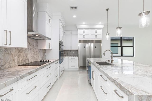 3098 Pine Tree DR, Naples, FL 34112
