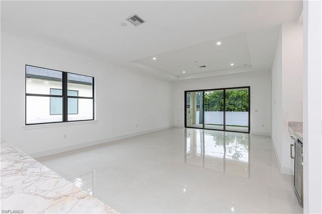 3098 Pine Tree DR, Naples, FL 34112
