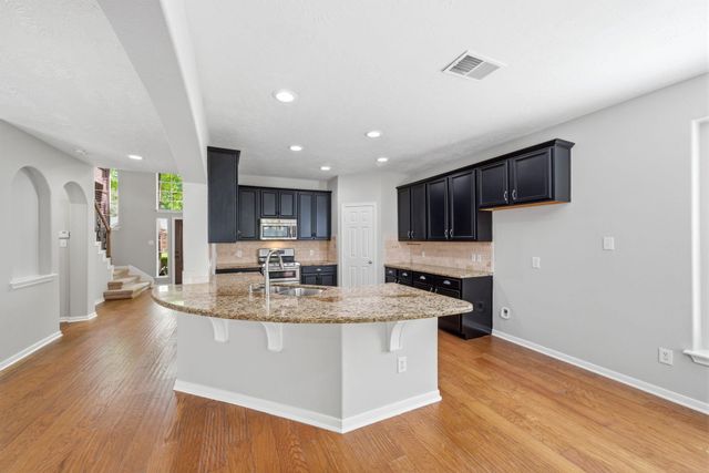 31 Harmony Hollow Court, The Woodlands, TX 77385