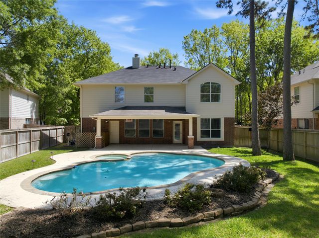 31 Harmony Hollow Court, The Woodlands, TX 77385