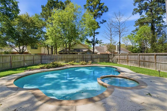 31 Harmony Hollow Court, The Woodlands, TX 77385