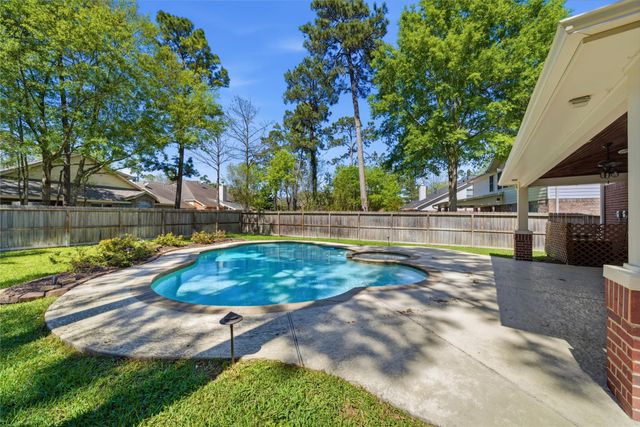 31 Harmony Hollow Court, The Woodlands, TX 77385