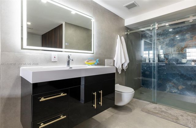 3665 NE 167th St 207 + 30' Deeded Dock, North Miami Beach, FL 33160