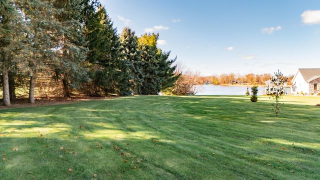 8573 W Lakeshore Drive, Perry, MI 48872