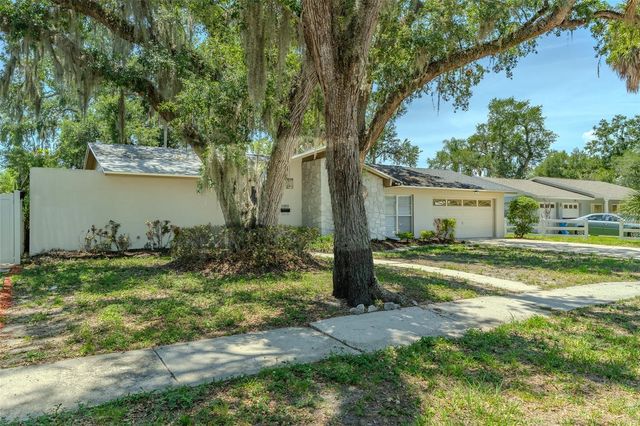 8018 W POCAHONTAS AVENUE, Tampa, FL 33615