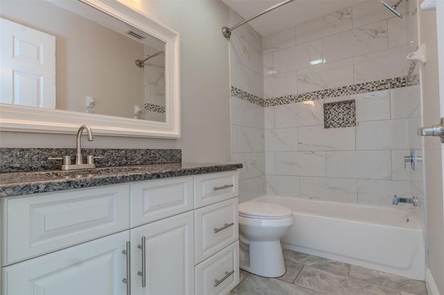 8018 W POCAHONTAS AVENUE, Tampa, FL 33615