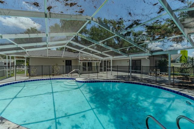 8018 W POCAHONTAS AVENUE, Tampa, FL 33615