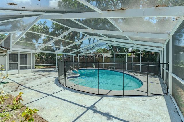 8018 W POCAHONTAS AVENUE, Tampa, FL 33615