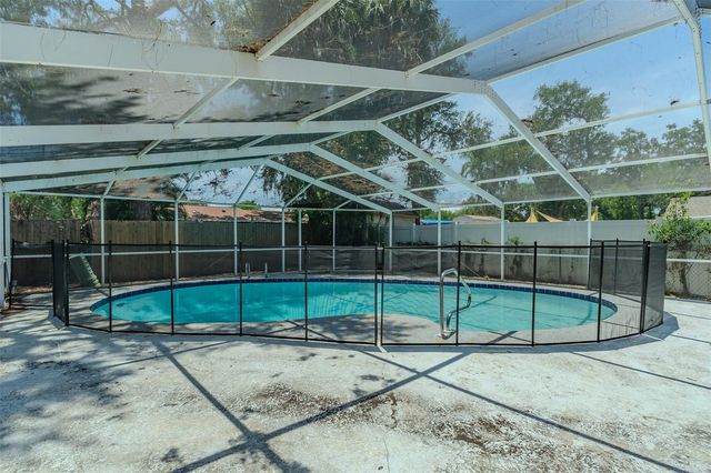 8018 W POCAHONTAS AVENUE, Tampa, FL 33615