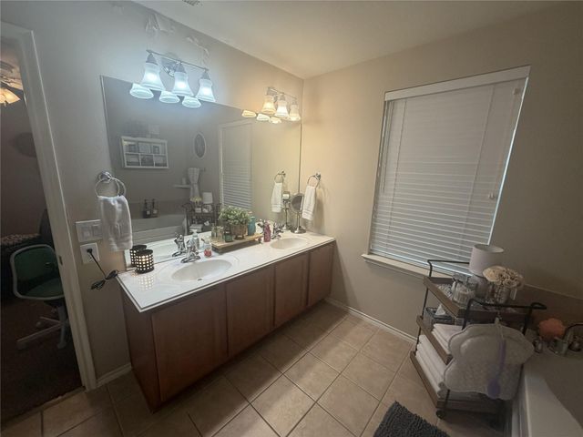 4714 Woodspring Glen Lane, Houston, TX 77345
