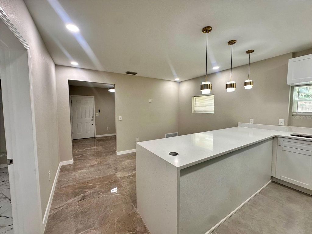 Image 12 of property listing at 8906 N ALBANY AVENUE, Tampa, FL 33604