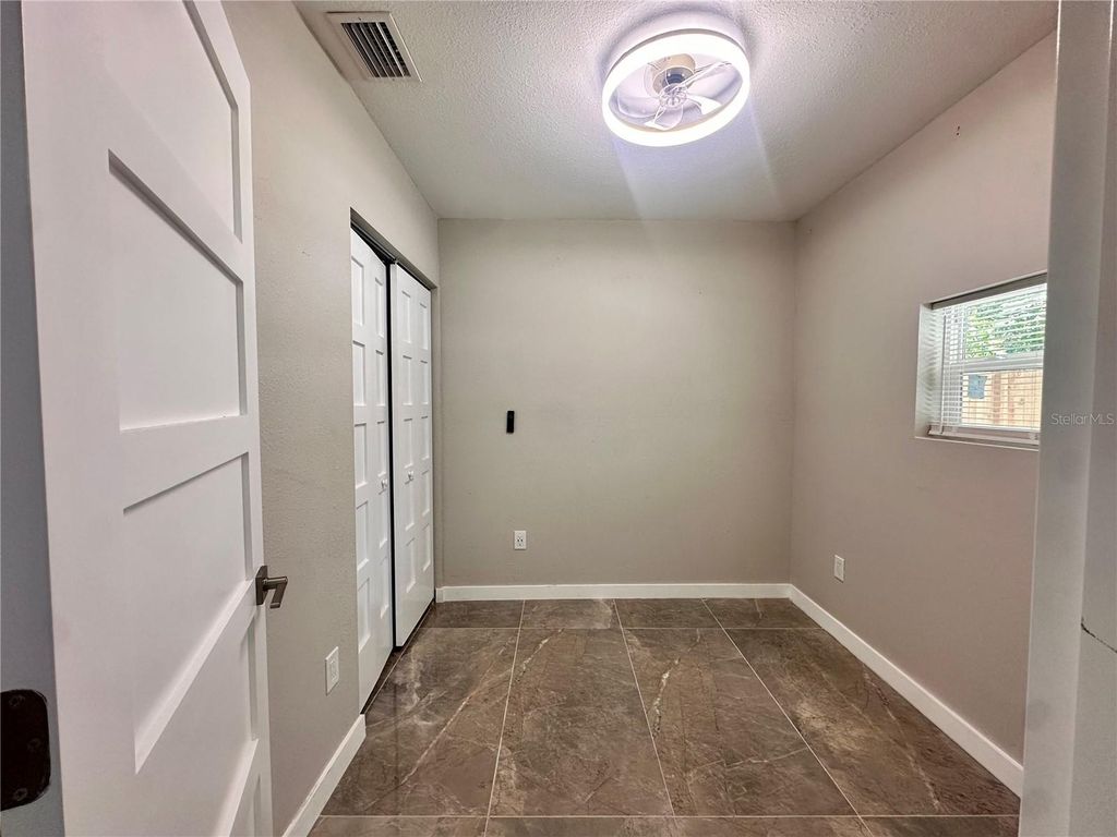 Image 5 of property listing at 8906 N ALBANY AVENUE, Tampa, FL 33604