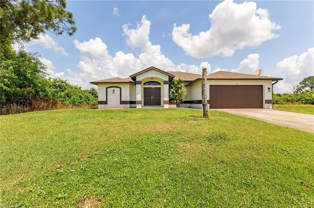 691 Manhattan ST E, LEHIGH ACRES, FL 33974 — exterior