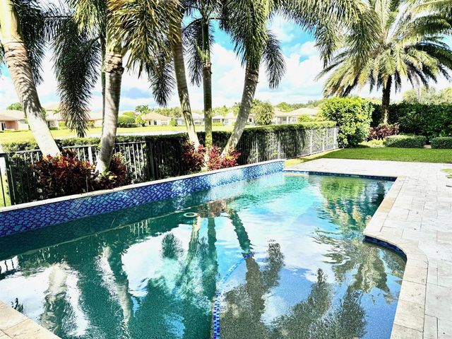 107 Via Escobar Place, Palm Beach Gardens, FL 33418