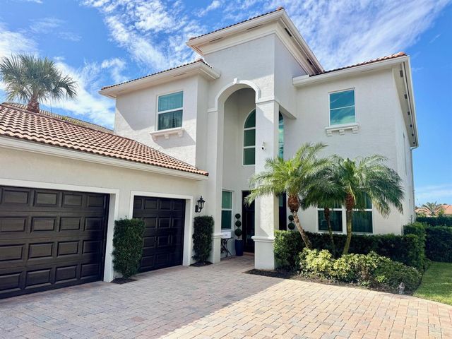 107 Via Escobar Place, Palm Beach Gardens, FL 33418