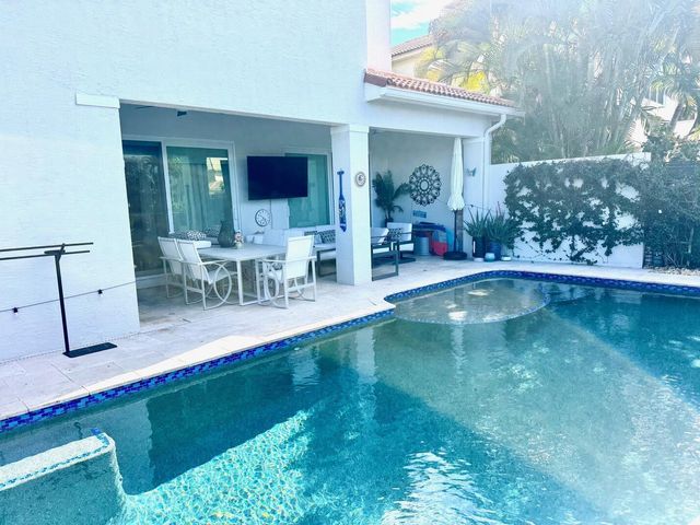 107 Via Escobar Place, Palm Beach Gardens, FL 33418