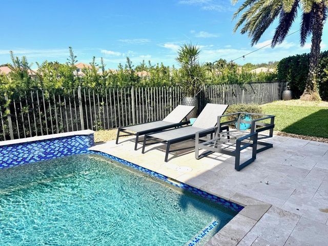 107 Via Escobar Place, Palm Beach Gardens, FL 33418