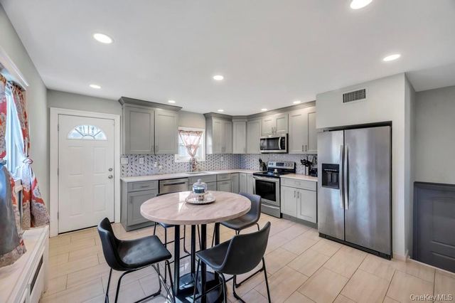 221 Cedar Court, Copiague, NY 11726