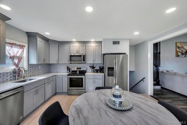 221 Cedar Court, Copiague, NY 11726