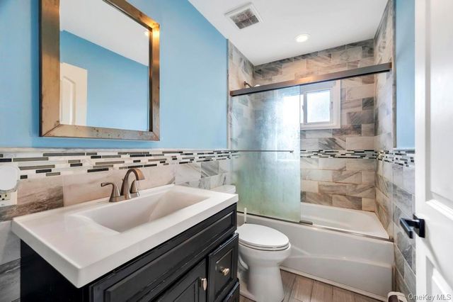 221 Cedar Court, Copiague, NY 11726