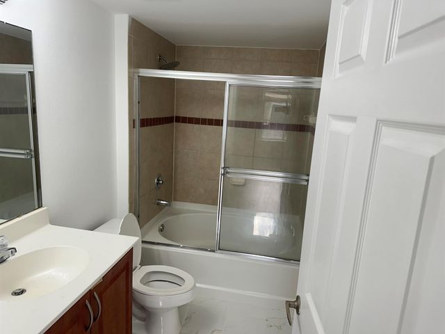 6410 Emerald Dunes Drive 105, West Palm Beach, FL 33411