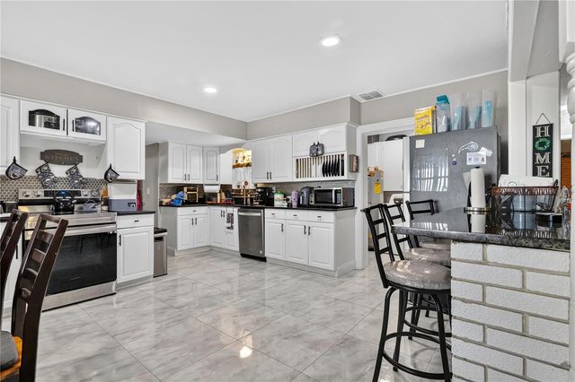 9727 BEAR LAKE ROAD, Apopka, FL 32703