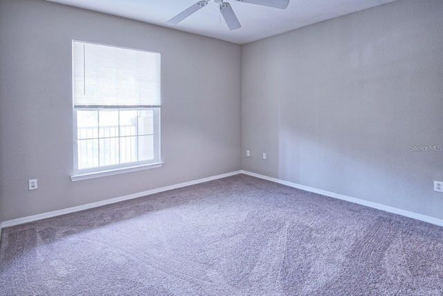 10019 COURTNEY PALMS BOULEVARD 302, Tampa, FL 33619