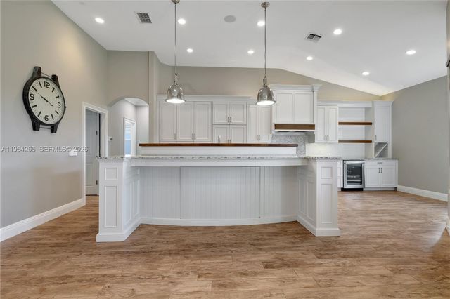 327 Burnt Pine Dr, Naples, FL 34119