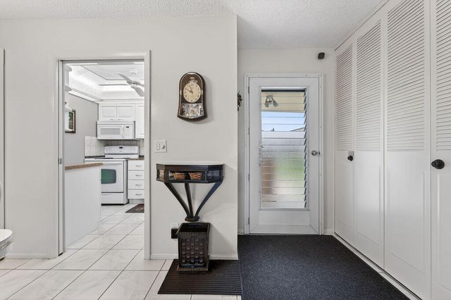 2971 W Crosley Drive F, West Palm Beach, FL 33415