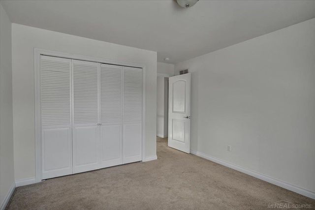 50444 Pinnacle Woods Lane, Macomb Twp, MI 48042