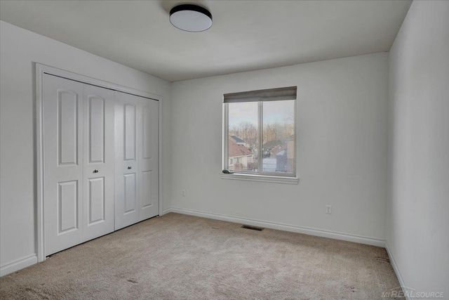 50444 Pinnacle Woods Lane, Macomb Twp, MI 48042