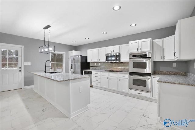 141 Old Silo Road, Laceys Spring, AL 35754