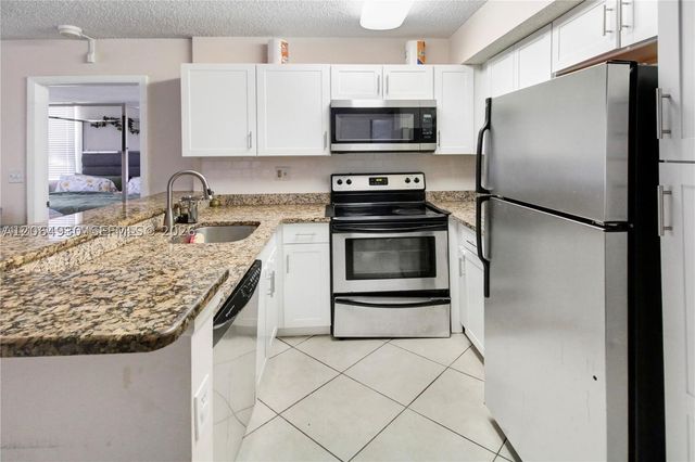 831 Lyons Rd 23101, Coconut Creek, FL 33063