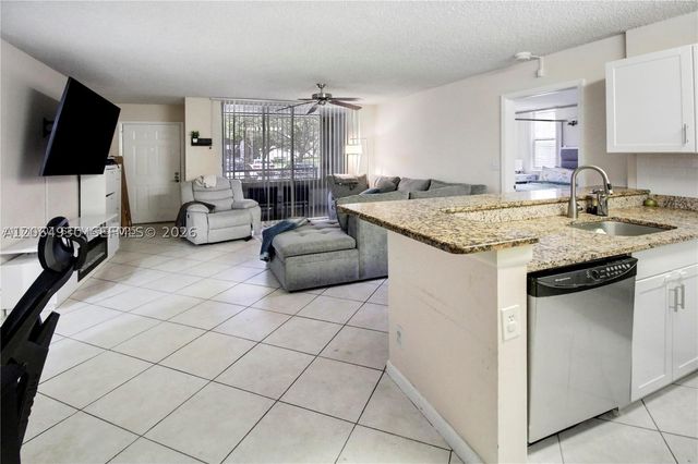 831 Lyons Rd 23101, Coconut Creek, FL 33063