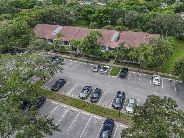 831 Lyons Rd 23101, Coconut Creek, FL 33063