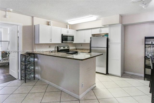 831 Lyons Rd 23101, Coconut Creek, FL 33063