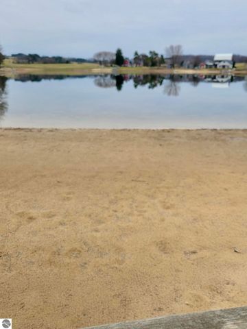 9464 Stone Ledge Lake Drive, Cadillac, MI 49601