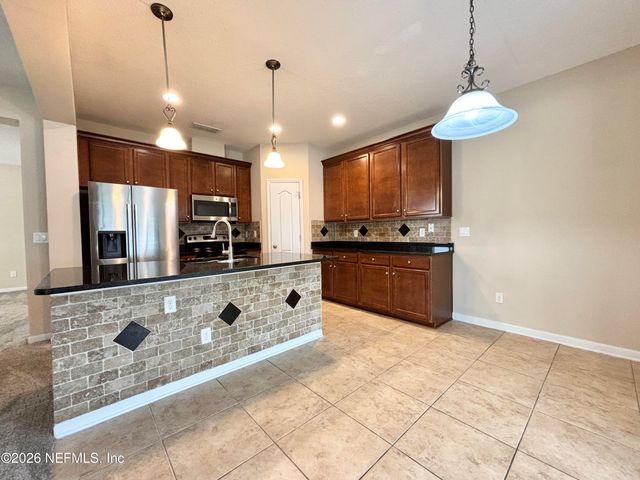 850 QUIET STONE Lane, Orange Park, FL 32065