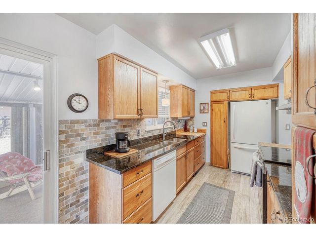 8227 Vanguard Dr, Denver, CO 80221