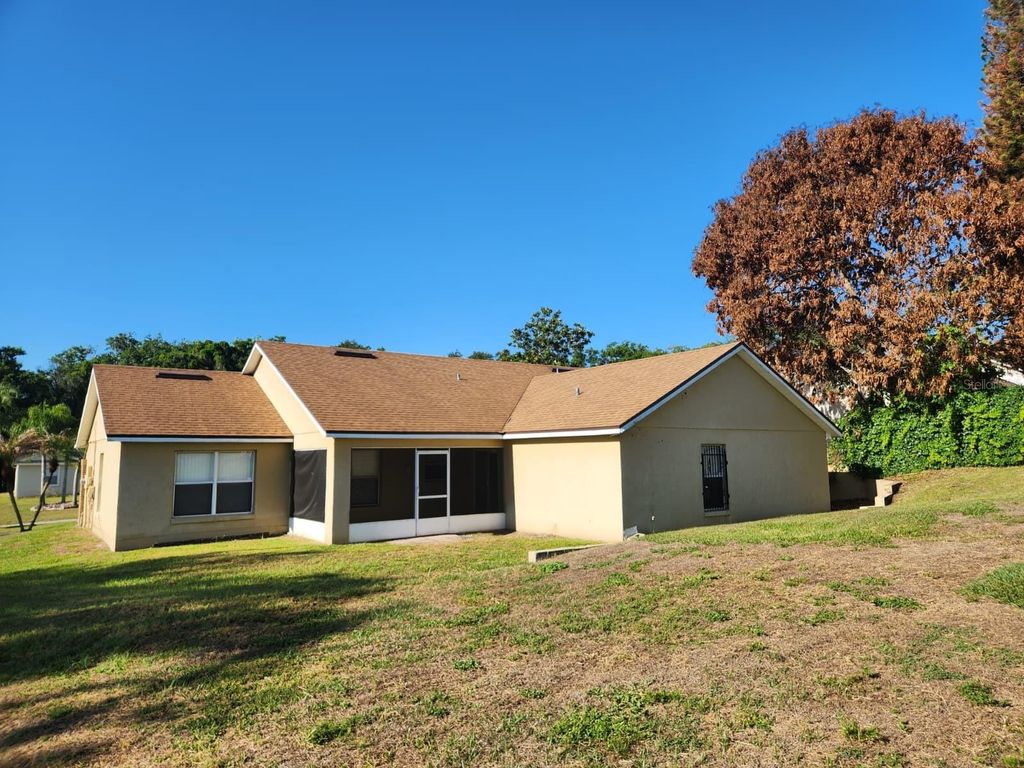 Image 2 of property listing at 8001 STIRRUPWOOD COURT, Orlando, FL 32818