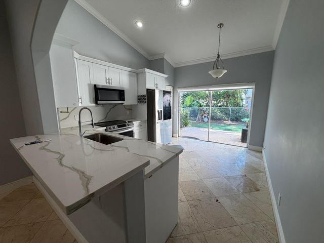 7657 Sanctuary Drive, Coral Springs, FL 33065