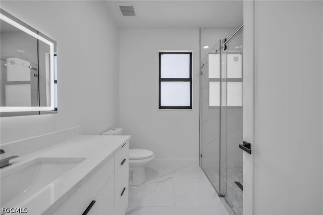 1618 Moore AVE, Lehigh Acres, FL 33972