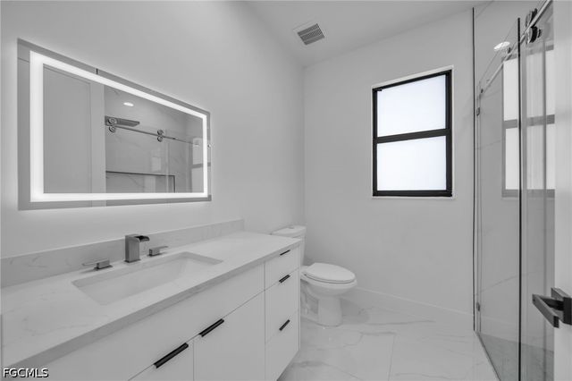 1618 Moore AVE, Lehigh Acres, FL 33972