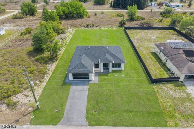 1618 Moore AVE, Lehigh Acres, FL 33972