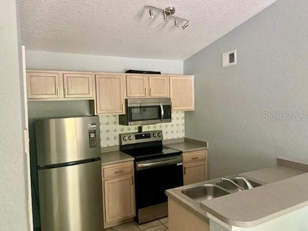 Image 3 of property listing at 8939 LATREC AVENUE 1307, Orlando, FL 32819