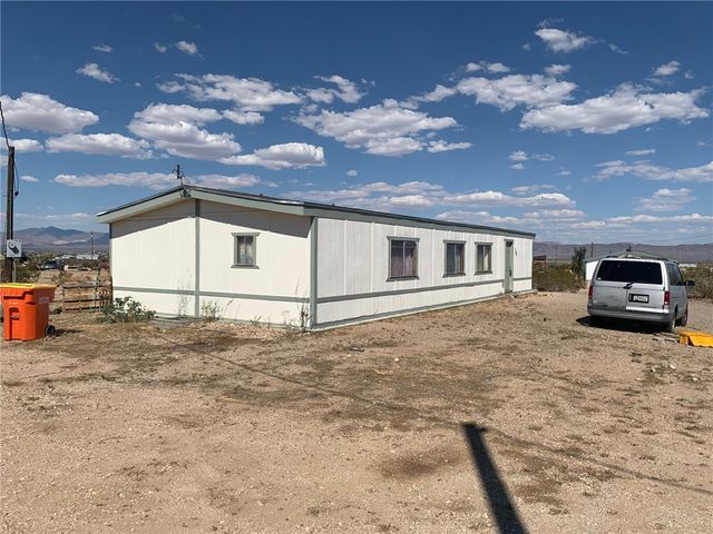 7587 W Unkar Drive, Golden Valley, AZ 86413