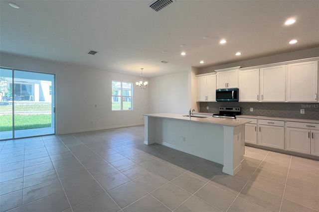7036 ROLLING LEAF ROAD, Groveland, FL 34736