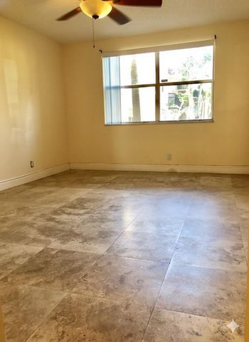 8721 Wiles Road 104, Coral Springs, FL 33067